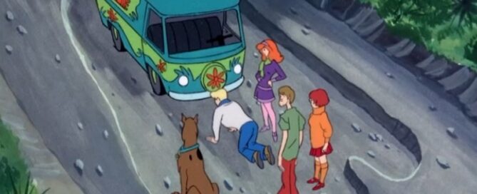 Mystery Machine in a giant footprint
