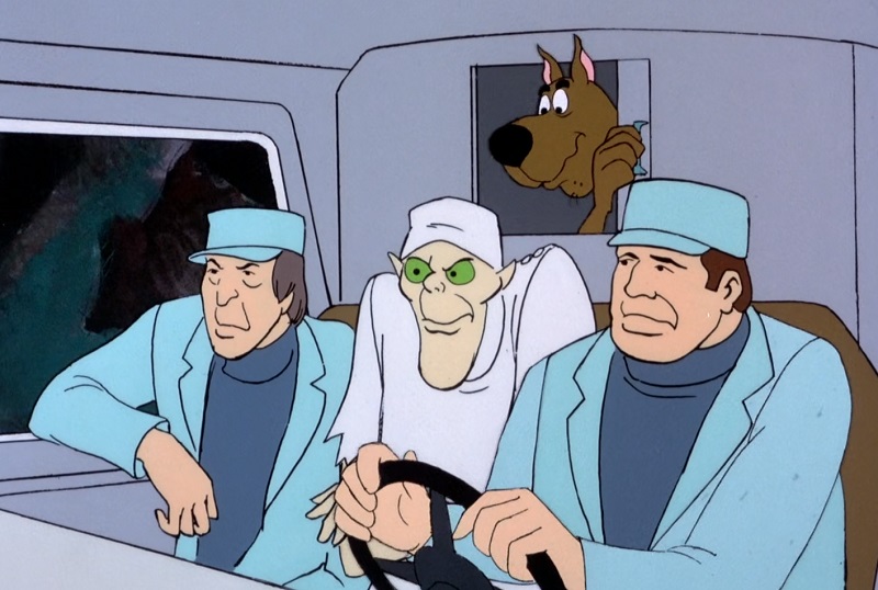 Scooby looks in on Dr. Coffin