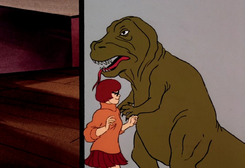 Velma with a dinosaur