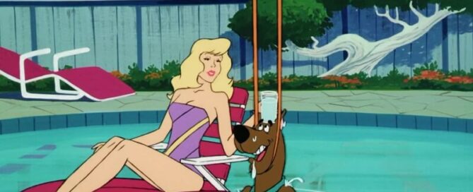 Scooby in a pool with a woman