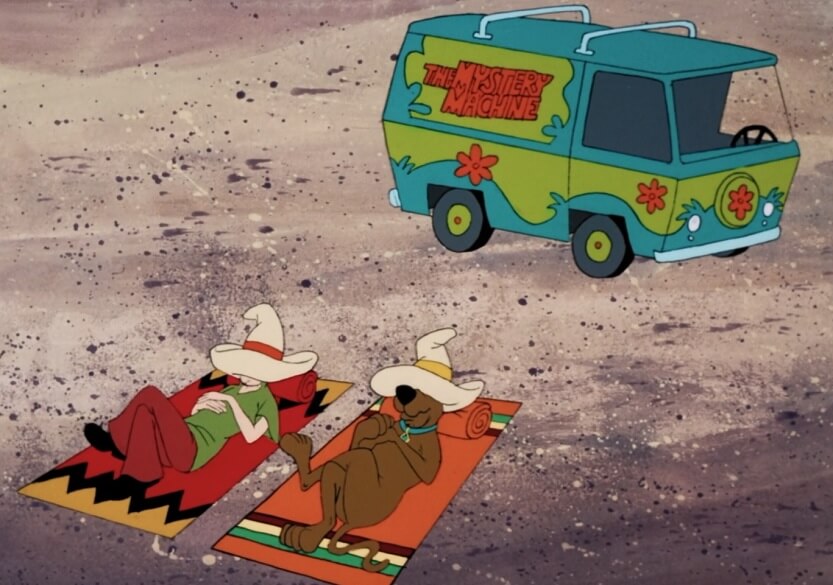 Scooby and Shaggy Sleeping in front of the Mystery Machine