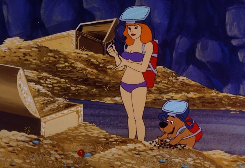 Daphne Blake and Scrappy surrounded by treasure