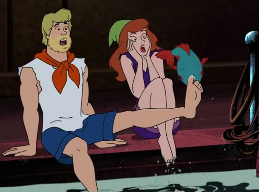 Piranha biting Fred's toe