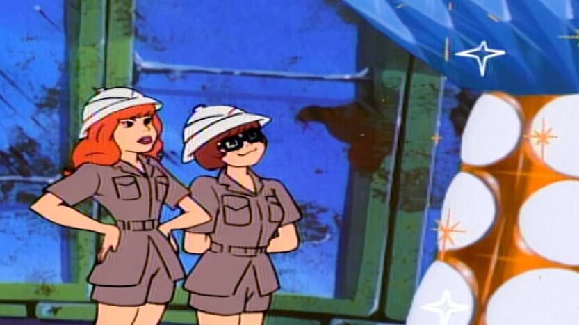 Velma and Daphne looking at the treasure