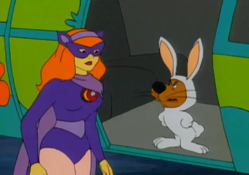 Daphne is a cat woman costume and Scrappy as a bunny